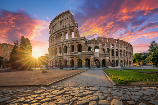 Colosseum in Rome covered in morning sunshine